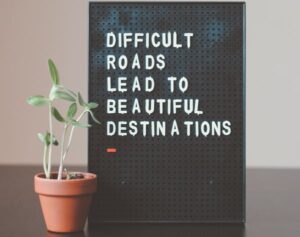 Quote "Difficult roads lead to beautiful destinations"